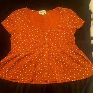 light orange flowy shirt